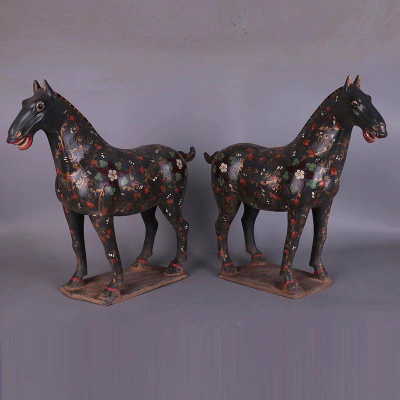 a pair of hand-painted war horses