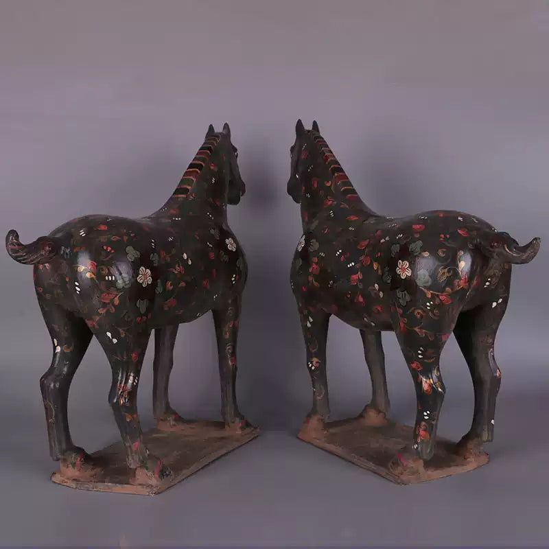 a pair of hand-painted war horses