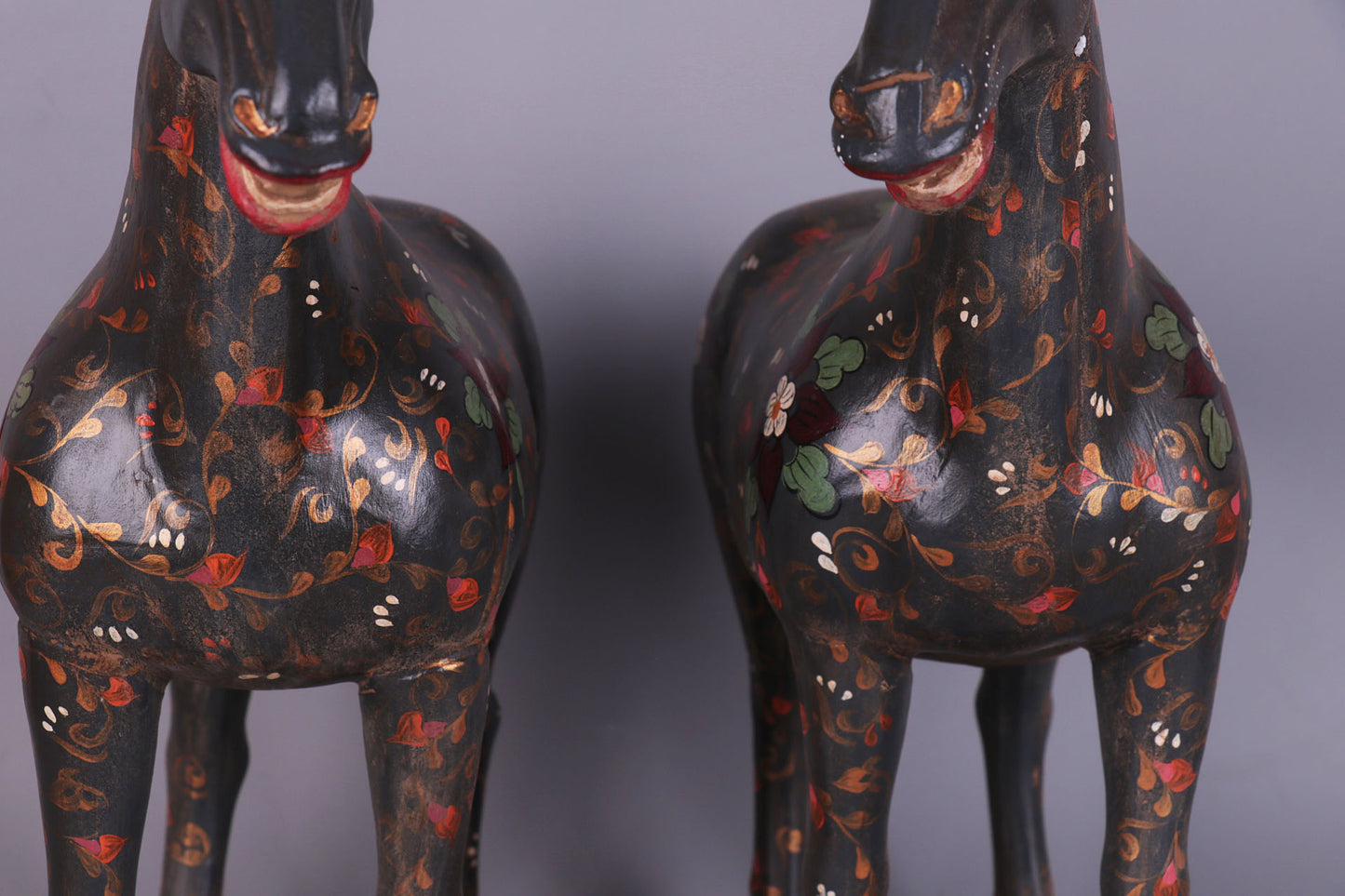 a pair of hand-painted war horses