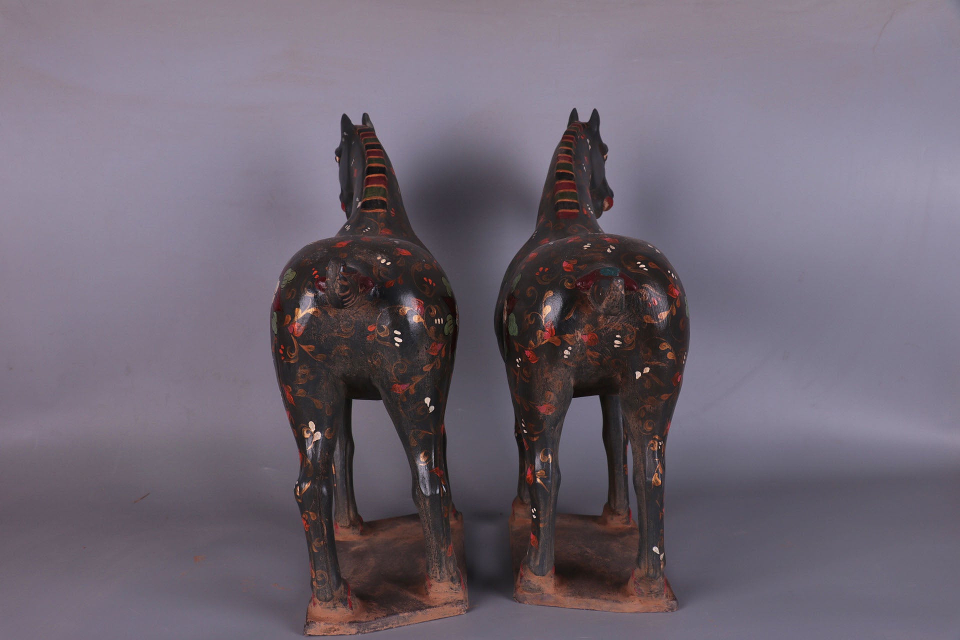 a pair of hand-painted war horses