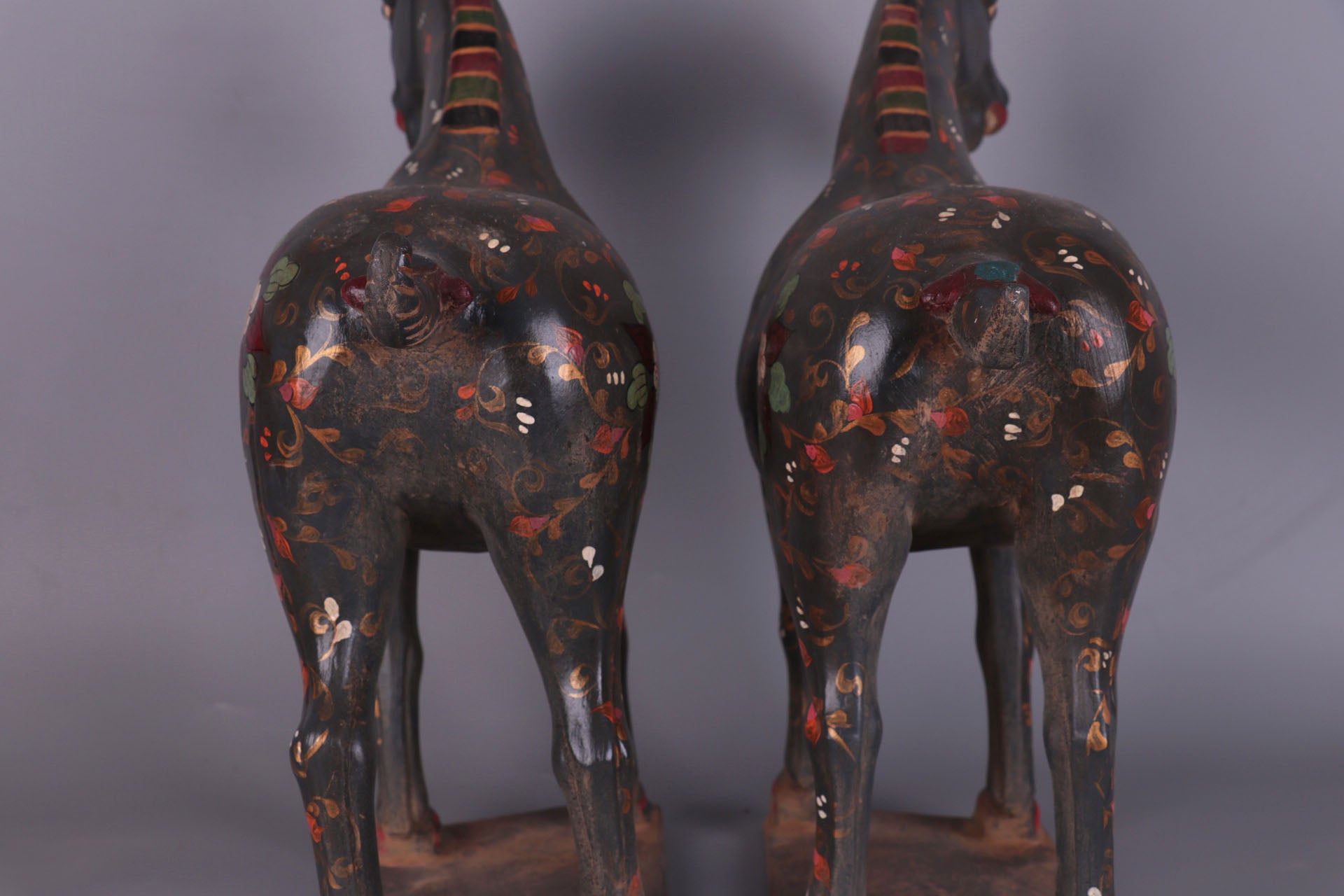 a pair of hand-painted war horses