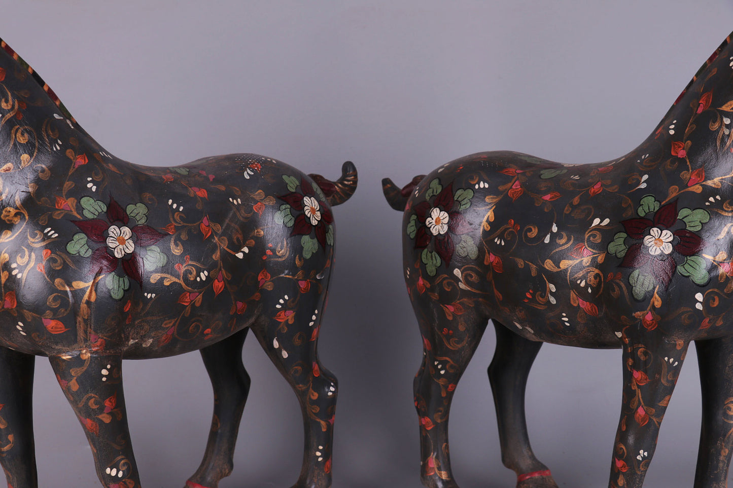 a pair of hand-painted war horses