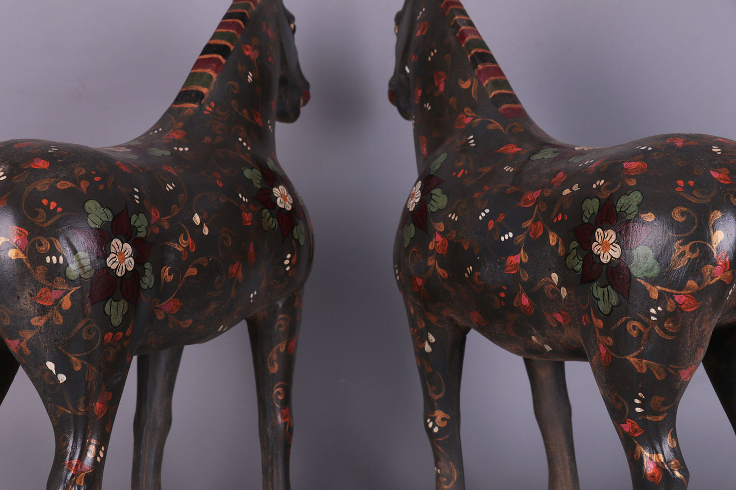 a pair of hand-painted war horses