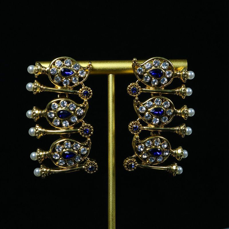 Vintage palace style sapphire necklace and earring set densely inlaid with full diamonds